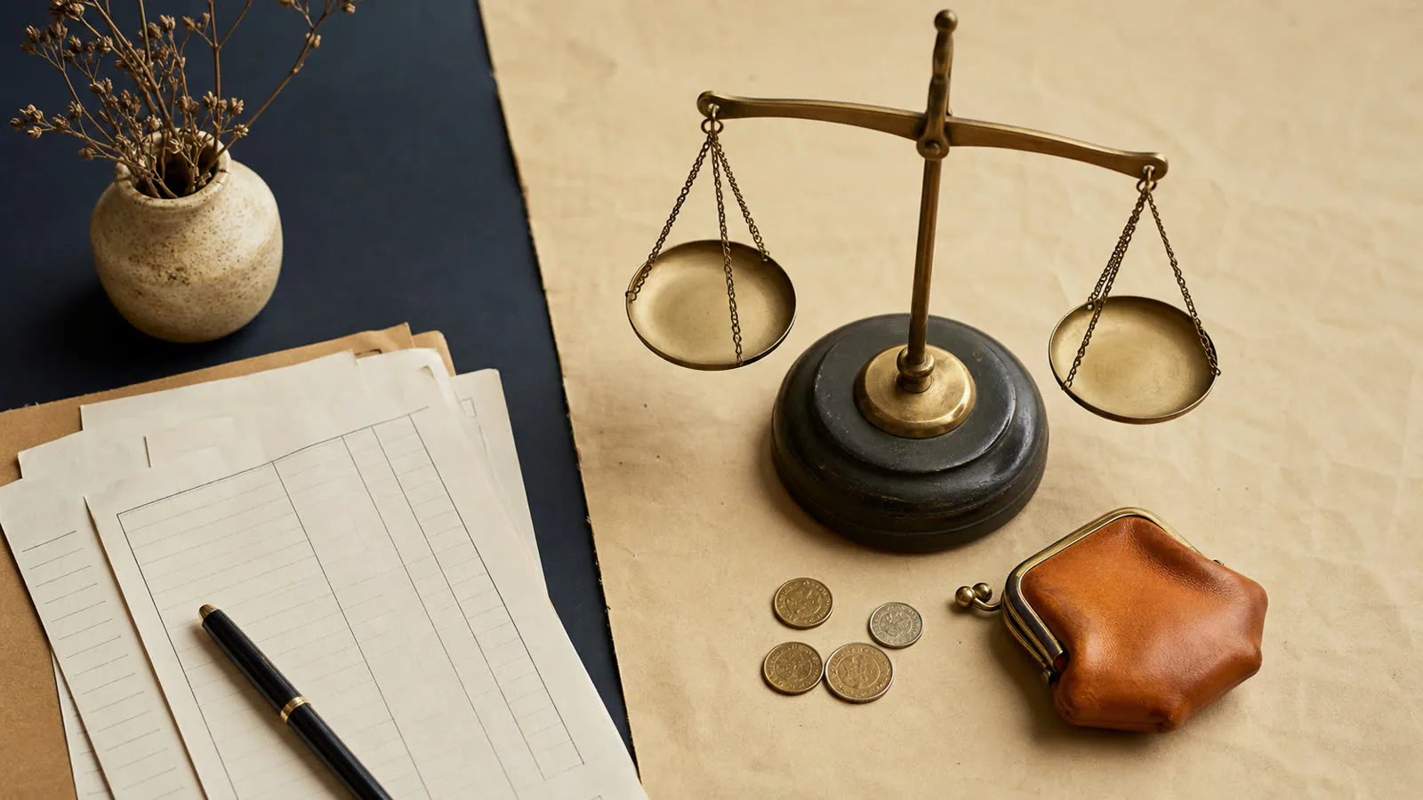 Editorial icon board showing a handshake token, a rand figure and a signed agreement on warm paper